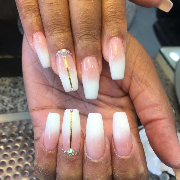 White ombré nails take the classic contrast of the French manicure and gives it a diffused and modern refresh. If you're looking for the best white ombré nails, here are 20 manicure ideas you're going to love.