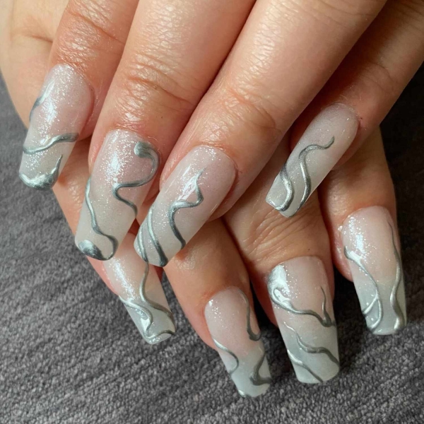 White ombré nails take the classic contrast of the French manicure and gives it a diffused and modern refresh. If you're looking for the best white ombré nails, here are 20 manicure ideas you're going to love.